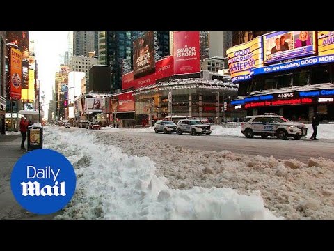 Times Square snow clean up is underway after storm Jonas - Daily Mail